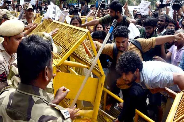 Student body entering NDA campus; Police batoned