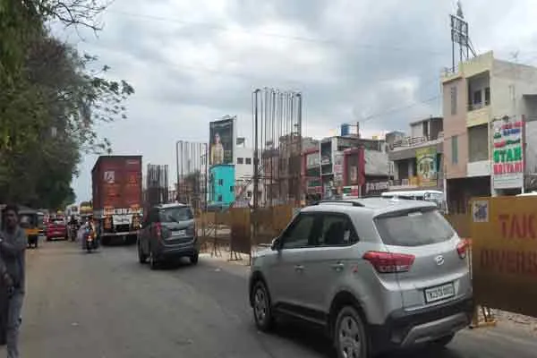ambur bus stand near highway fly over bridge people asked temporary bus stop 