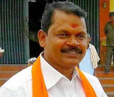அ