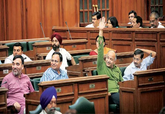 delhi aap party karaval nagar kapil mishra mla disqualified announced assembly speaker 