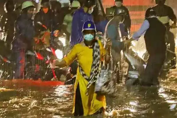 IT staff going to office in tractors; Condition caused by continuous rain in bangalore 