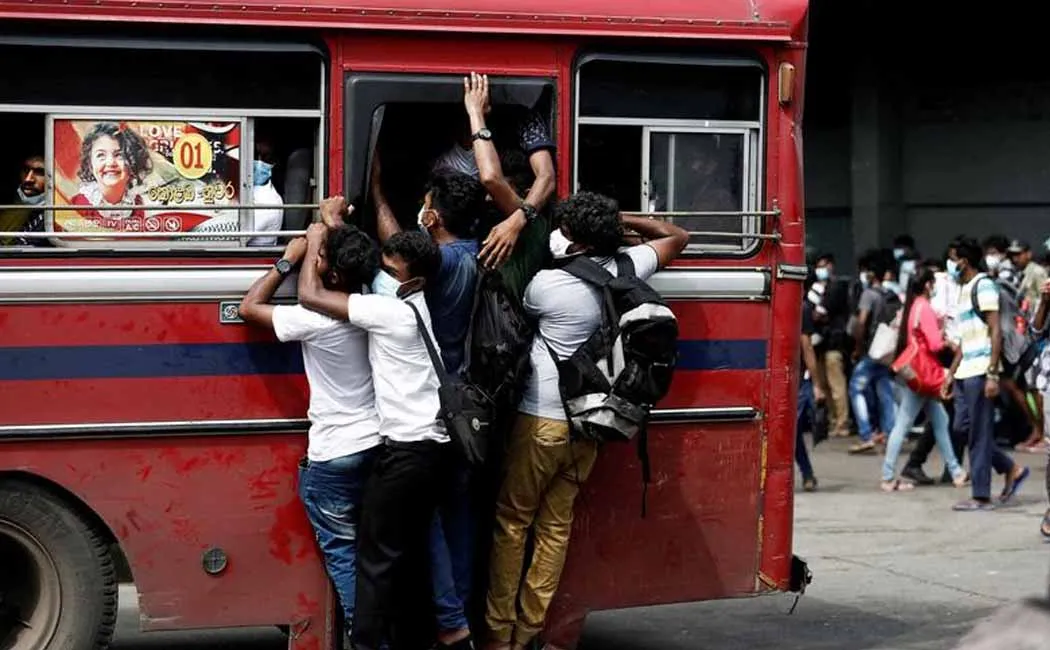 Crowds of people traveling in limited buses!
