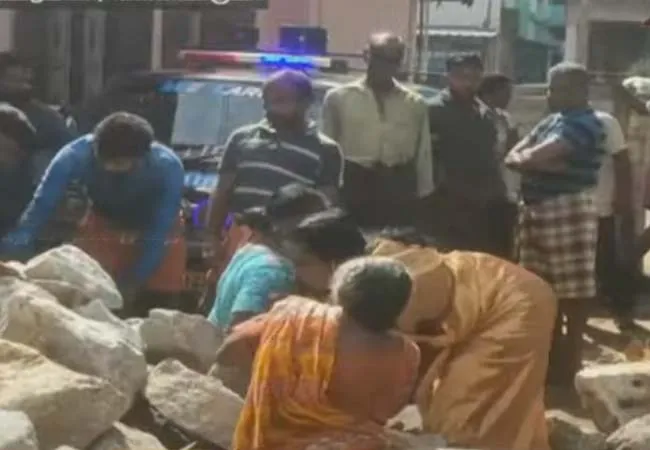 Ambulance unable to go due to black stones -