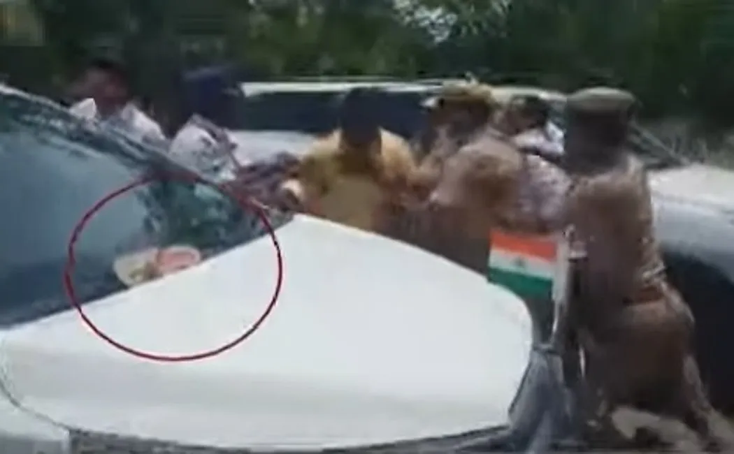 Throwing a shoe on Minister Palanivel Thiagarajan's car!