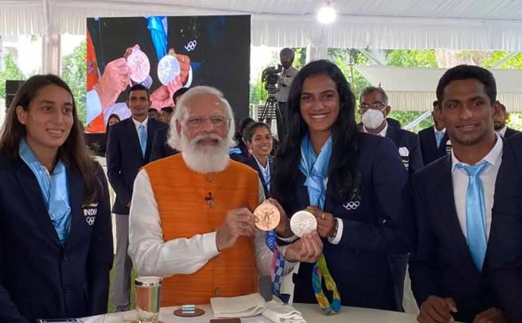 narendra modi - p.v sindhu 