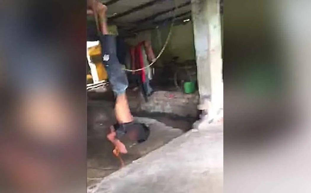 hanging a 14-year-old boy upside down and electrocuting him west bengal