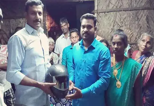 marriage function railway department inspector gift to helmet 