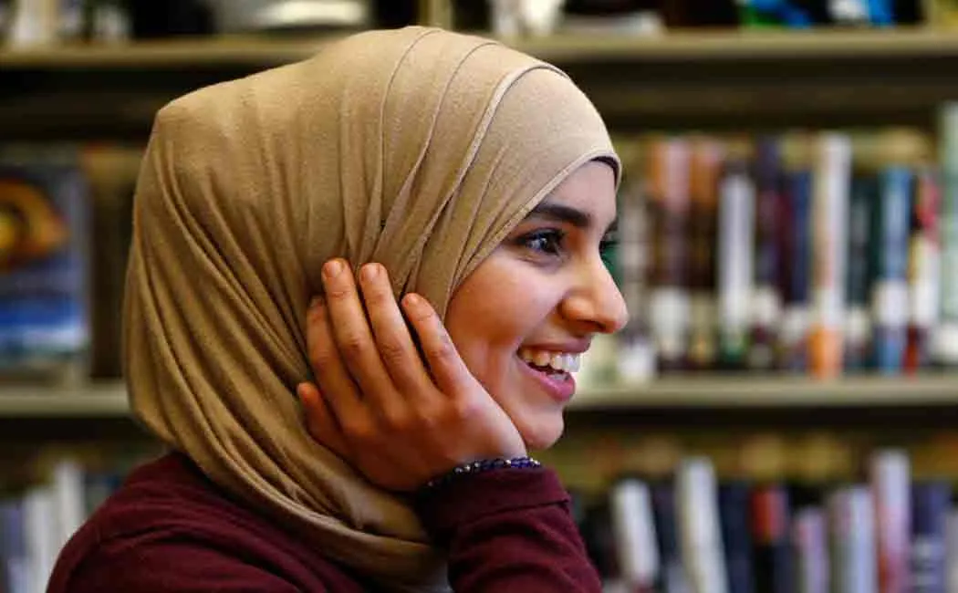 iran girl to be sentenced for removing her hijab