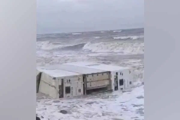 Cargo ship capsizes at sea containers washed ashore