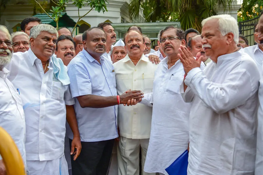 karnataka cm arrives america but congress party two mlas resign government crisis