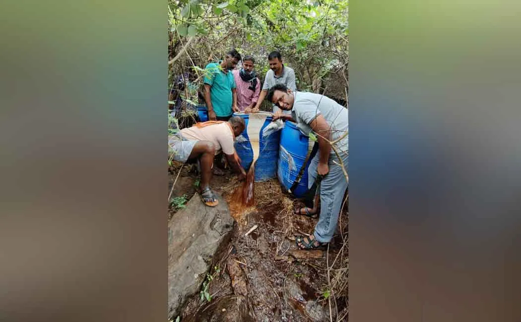 Police destroy thousands of liters of liquor