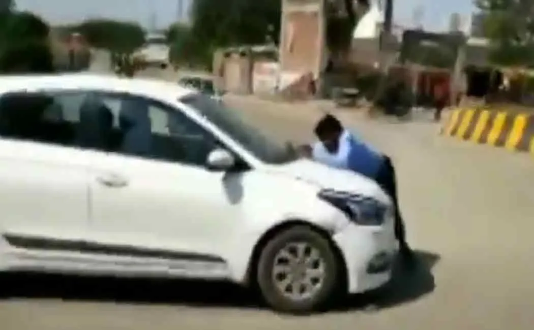 man in car