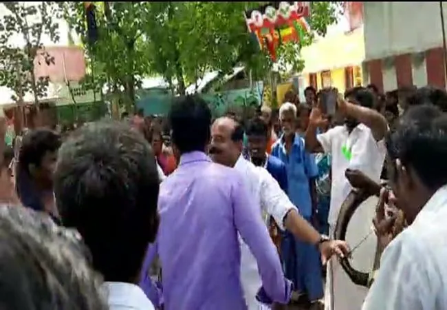 nanguneri assembly by election minister karuppanan dance 