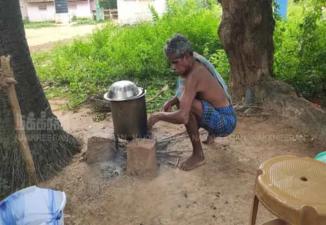 An old man who sells potion to customers in a market where not even a shop comes