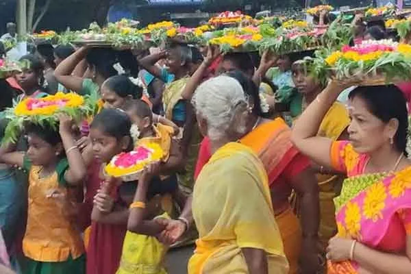 Muthumariamman temple flower sprinkling festival Tons of flowers