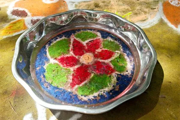 Golem floating on water Pongal greetings in Tamil writing Govt school girls are amazing
