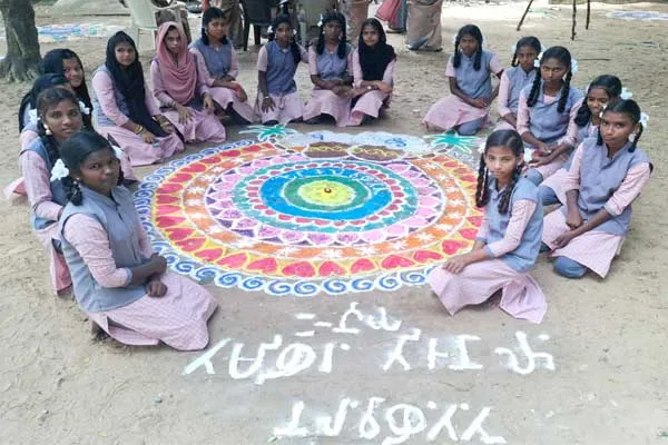 Golem floating on water Pongal greetings in Tamil writing Govt school girls are amazing