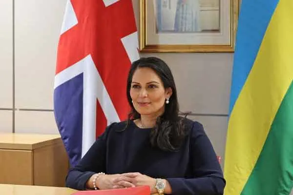 New Prime Minister of England; Home Minister resigns her Position