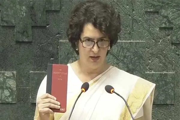 Priyanka Gandhi sworn in as MP with constitution book