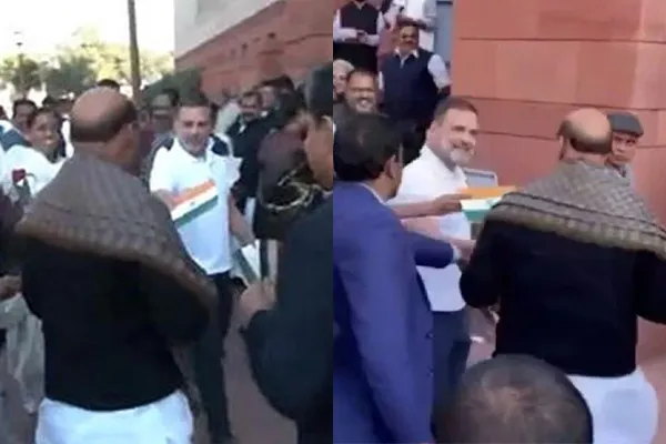 Rahul Gandhi gives rose to Union Minister Rajnath Singh
