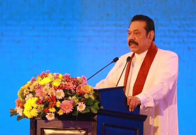 Mahinda family digs soil in Sri Lanka!