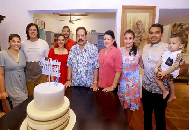 Mahinda family digs soil in Sri Lanka!