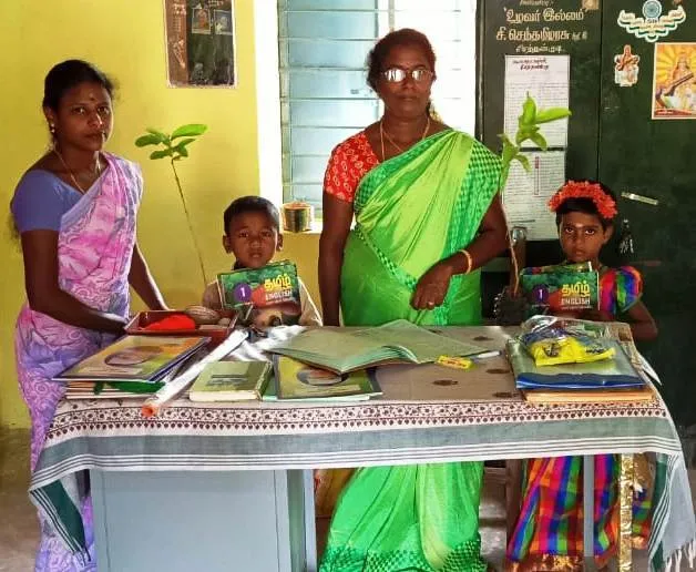  Schools open .. young people  welcome the students with trees