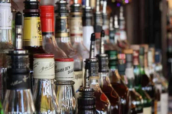 husband beat his wife to passed away because she didn't pay him to drink liquor