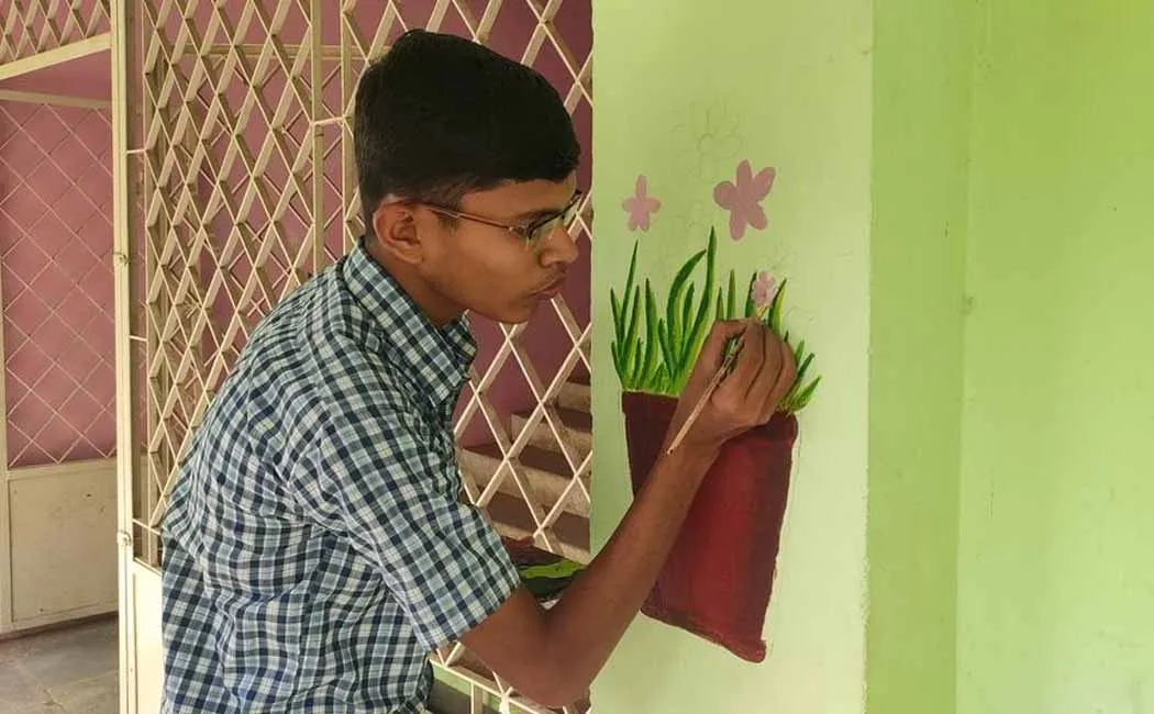 Government school student drawing and decorating on school walls!