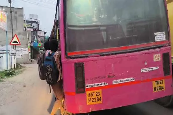 A miserable situation due to lack of additional buses for School students traveling hanging from stairs