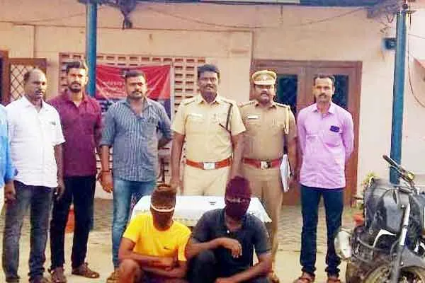  chain theft from  school teacher  police arrested two 