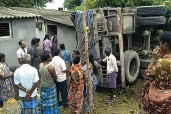 Leaning truck over houses!