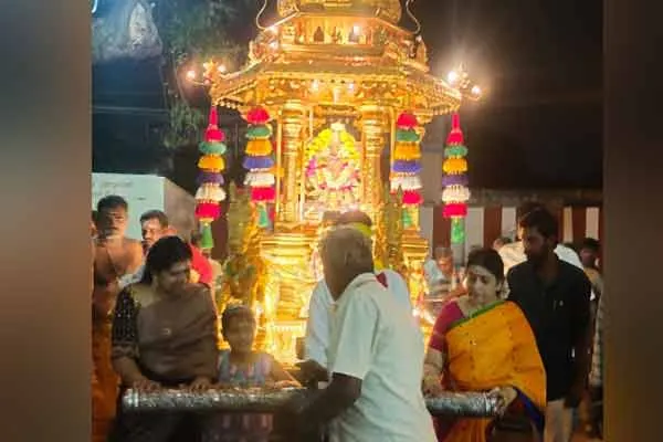 Birthday of Minister I. Periyasamy; Wife and daughter pull a golden chariot and worship
