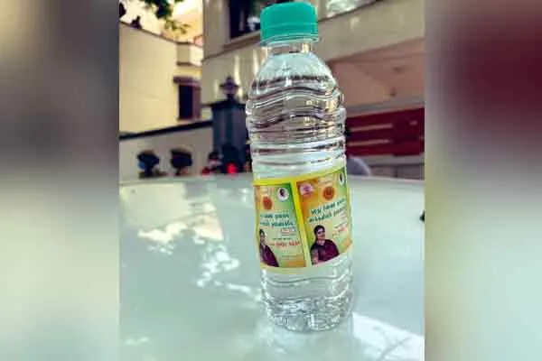 Thousand lights BJP candidate Kushboo's sticker in water bottle 