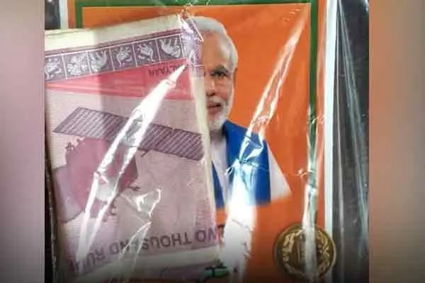 Gold coin with Modi image distributed to voters
