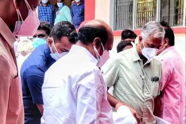Minister A V Velu.. social distancing in question 