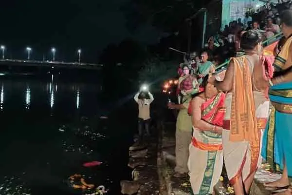 Devotees take Aarti at Vriddhachalam Manimuktar to run as a river of life!