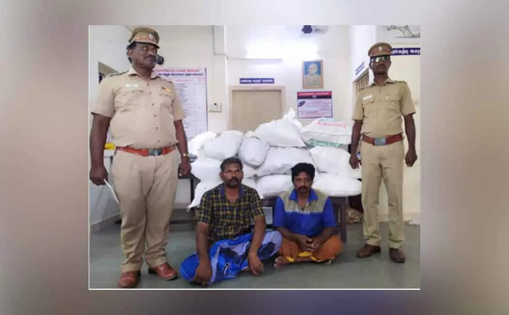 Two arrested for bringing banned items