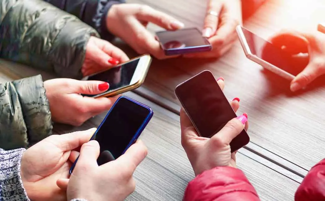 Students stuck with cellphones 