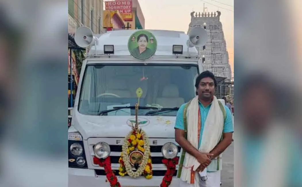 OPS Son who made special pooja for campaign van in Tirupati 
