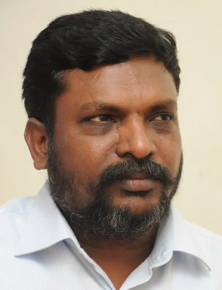தி
