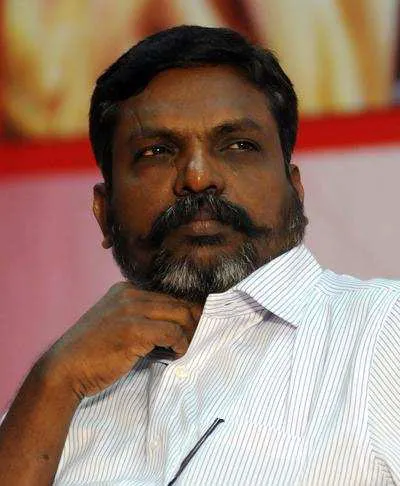 தி