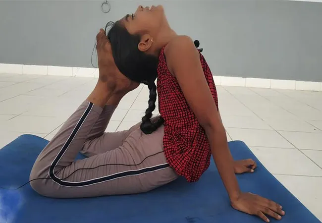 9-year-old girl claiming the artist's achievements as she did yoga!