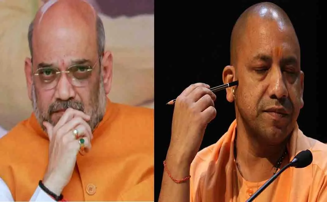 amit shah advises yogi adityanath to conduct rallies as per plan