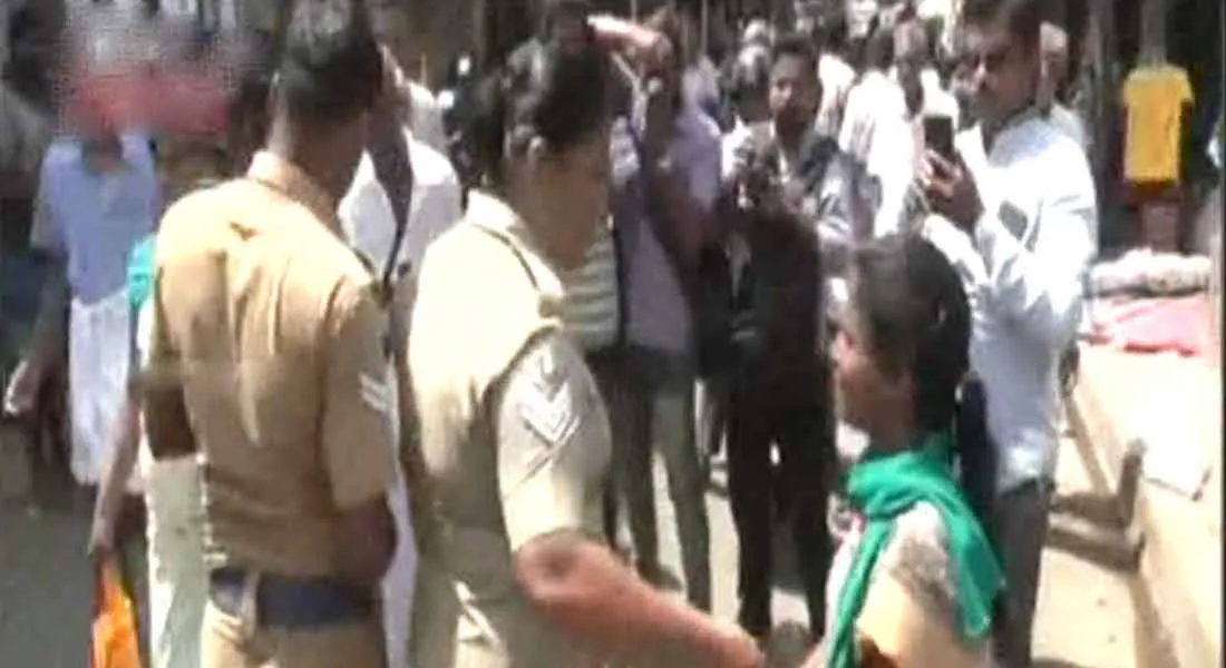 Woman was arrested for wiping out shoes with campaign 
