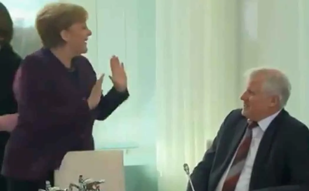 Angela Merkel was refused a handshake by German Minister 