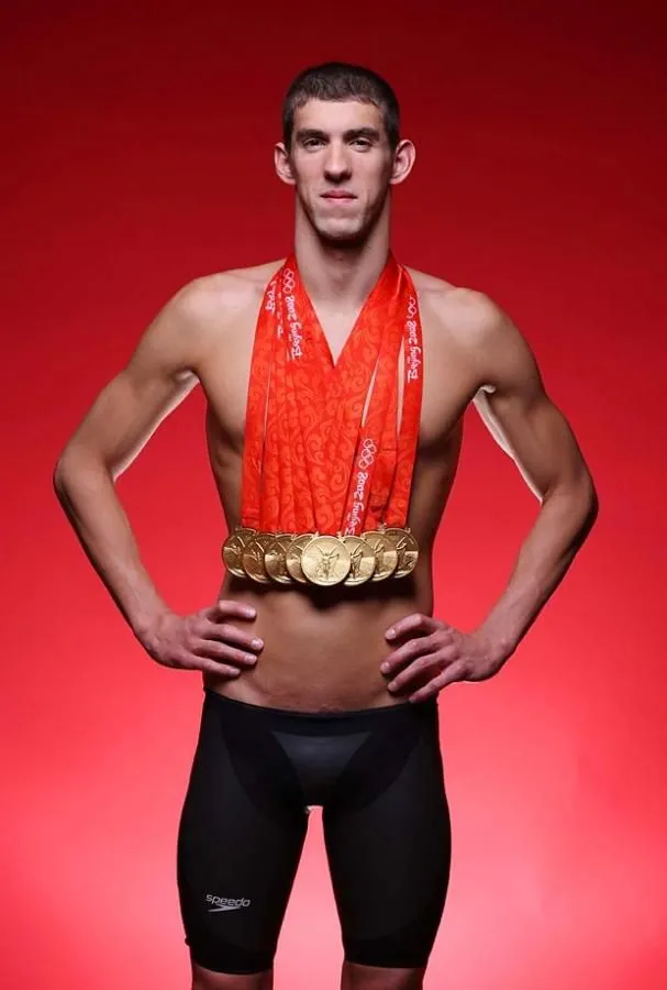 Here are 100 of SI's Best Portraits over the years | Michael phelps, Michael phelps medals, Sport girl