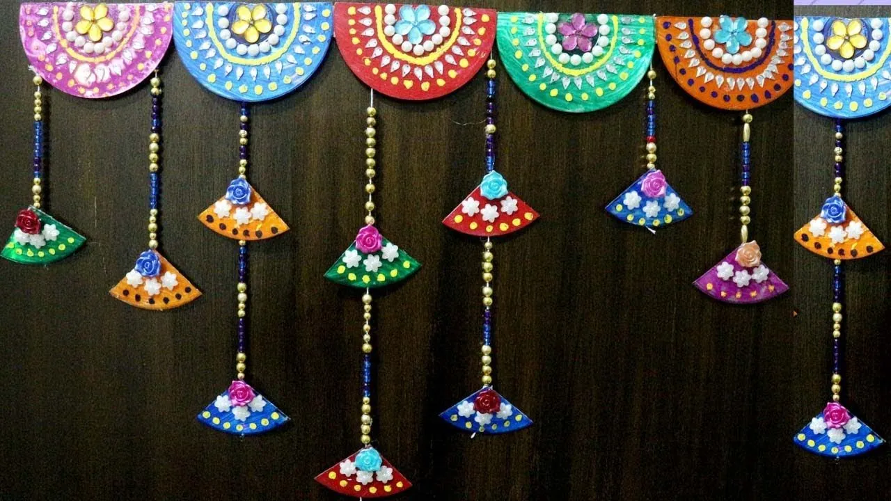 Best out of the waste wall hanging | Bandhanwar | Door hanging | Toran | Door hanging decorations, Diwali craft, Diy diwali decorations
