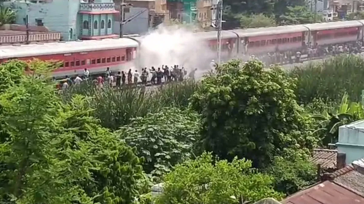 Smoke billowed out of the moving train