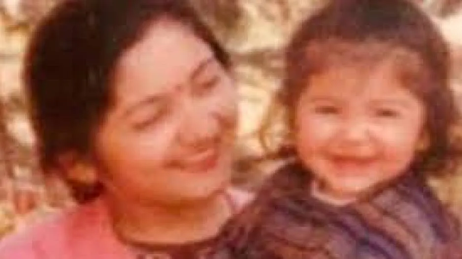 This girl in mother lap is a big bollywood actress